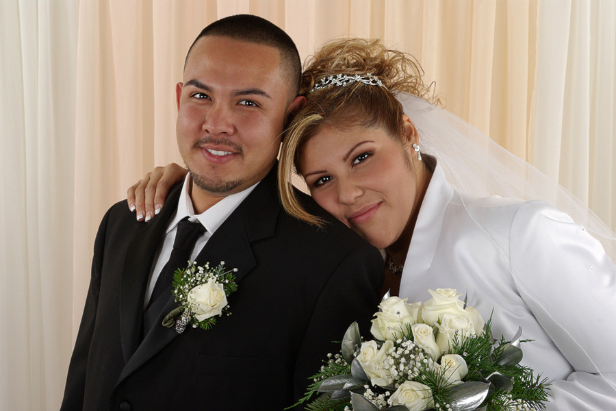 A happy bride and groom on their wedding day.